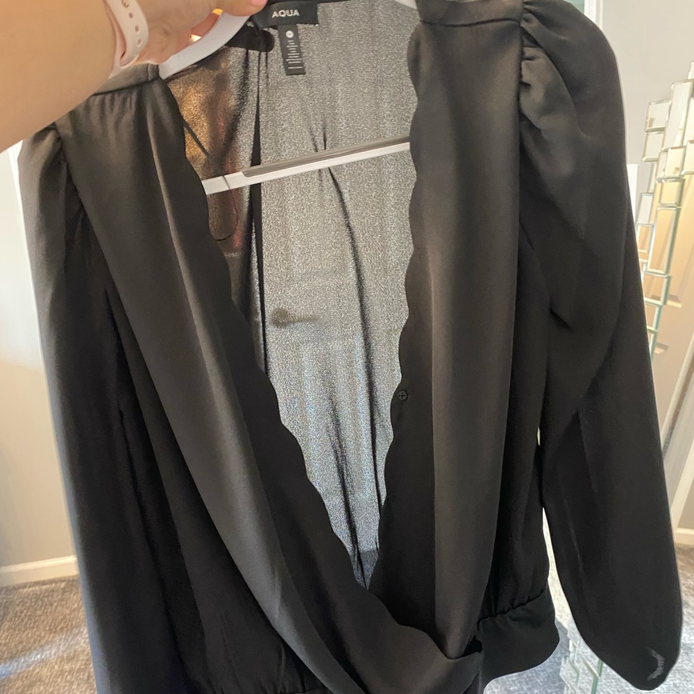 Aqua black body suit with v scalp neck line.